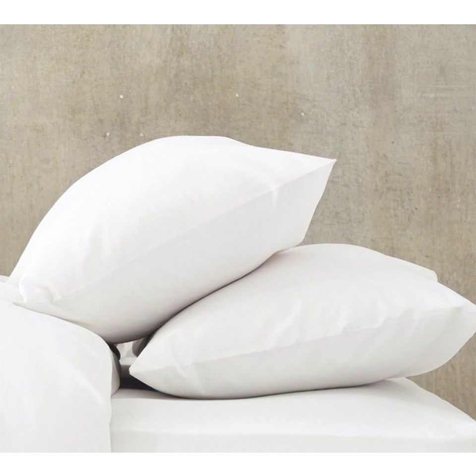 two pillows with 200 TC Cotton pillowcases on a bed